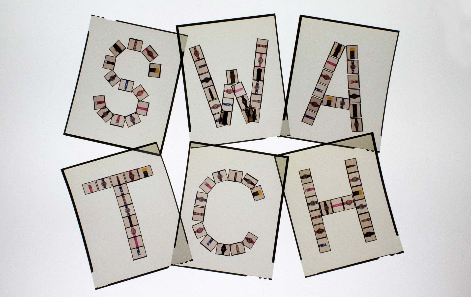 SWATCH PUZZLE Collection - the name Swatch built with small slides and re-photographed in slide format 4 "x5" - © Graziano Villa